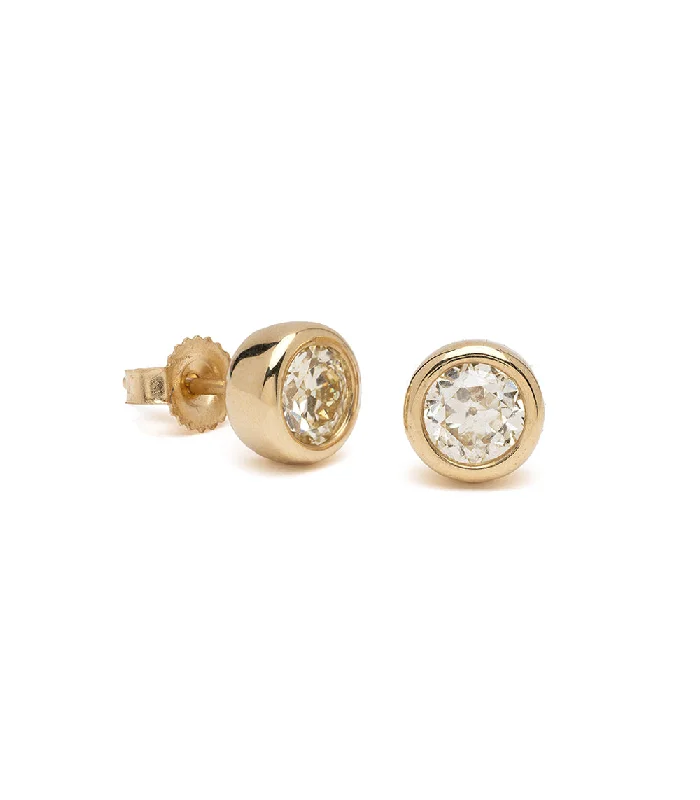 Best hoop earrings with smooth ceramic finishes for a polished, clean style-Diamond Bezel Studs