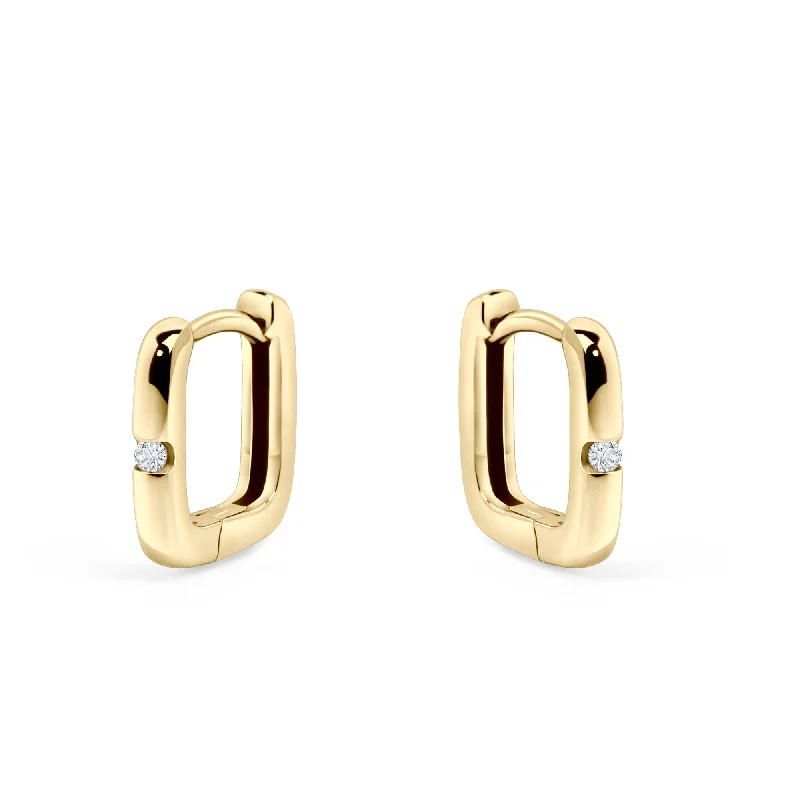 Hoop earrings with heart-shaped frames for a romantic and feminine look-Focus Huggie Earrings