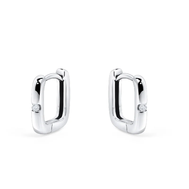 Hoop earrings with tortoiseshell designs for a chic and classic style-Focus Huggie Earrings