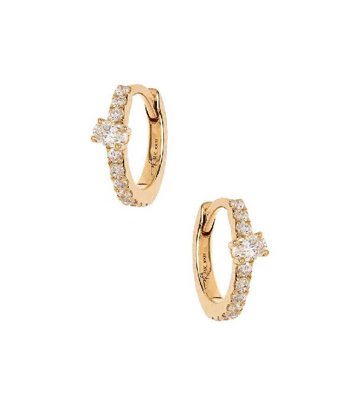 Hoop earrings with circle designs for a classic and timeless shape-Tiny Oval Huggie