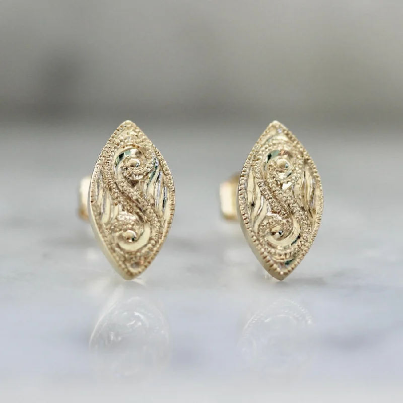 Best hoop earrings with asymmetrical designs for a fashion-forward, avant-garde look-On Holiday Engraved Gold Studs