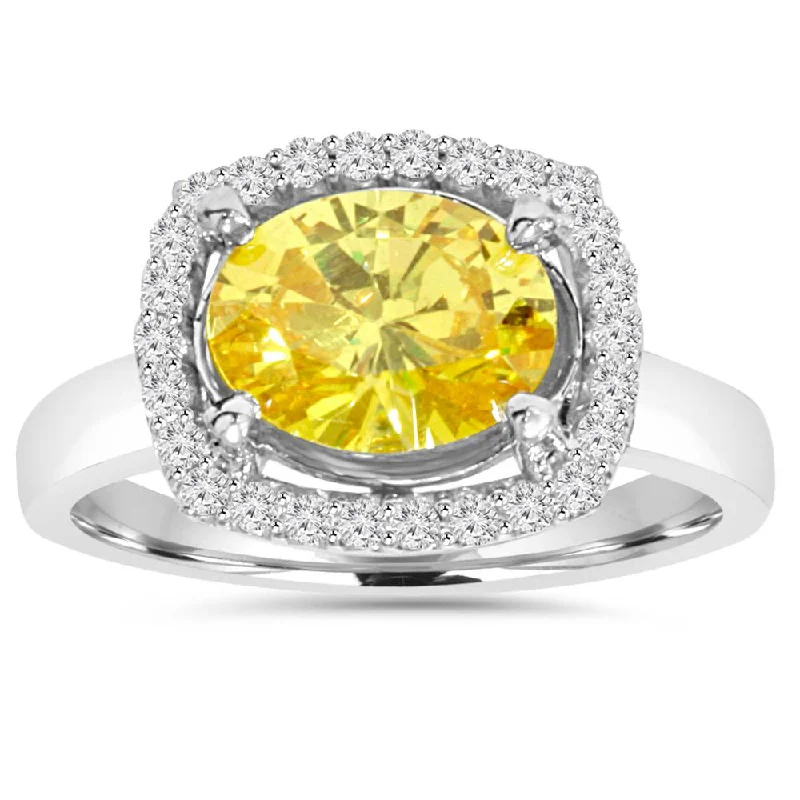 Rings with bold ruby stones for drama -2.26Ct Oval Citrine & Diamond Halo Ring 10K White Gold