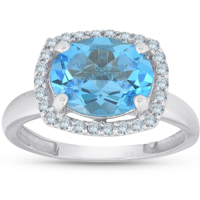 Rings with star sapphire for unique glow -2ct Oval Blue Topaz and Diamond Halo Ring 10K White Gold