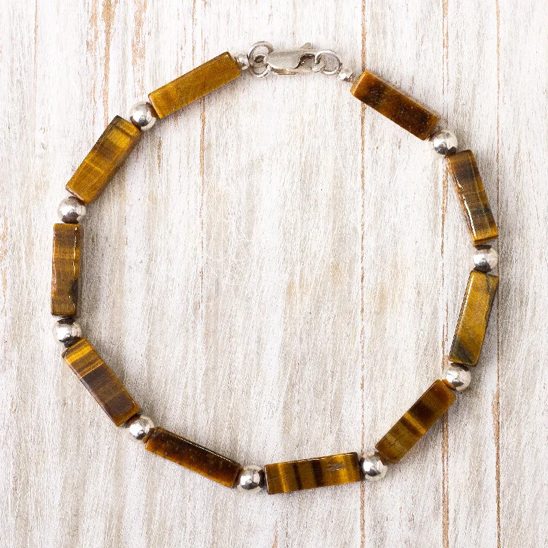 Best bangle bracelets with animal motif designs for a quirky, fun accessory-Earthen Sophistication Tiger's Eye Beaded Bracelet Crafted in Peru