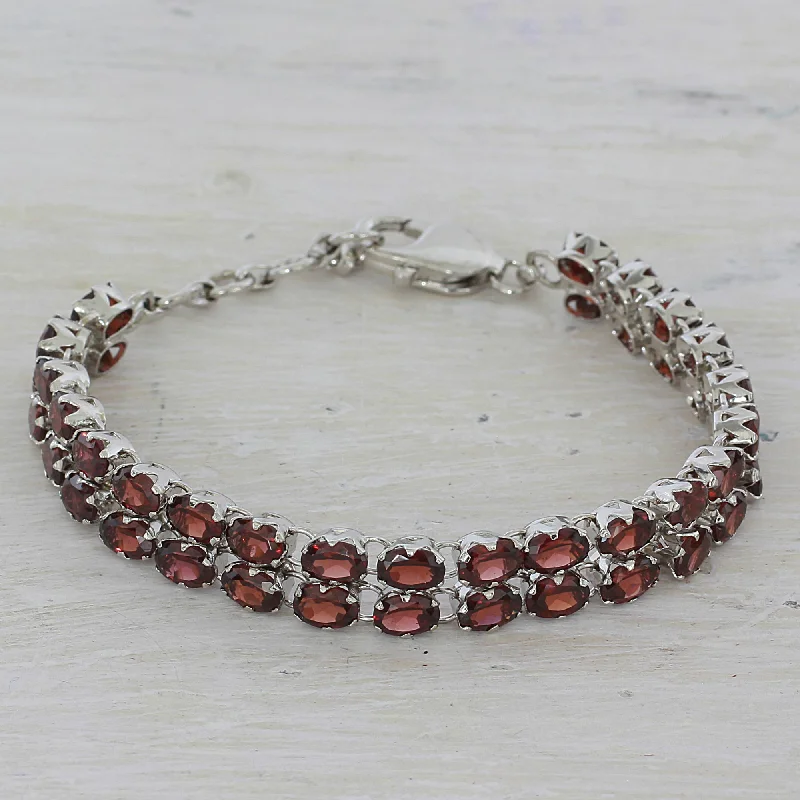 Elegant bangle bracelets with diamond-cut designs for added sparkle and elegance-Fiery Glam Garnet Silver Tennis Bracelet