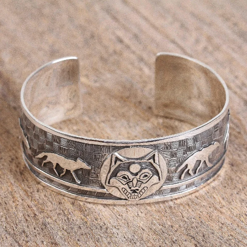 Best bangle bracelets with engraved birthstones for a personalized, meaningful gift-Lunar Wolves Taxco Sterling Silver Wolf Cuff Bracelet from Mexico