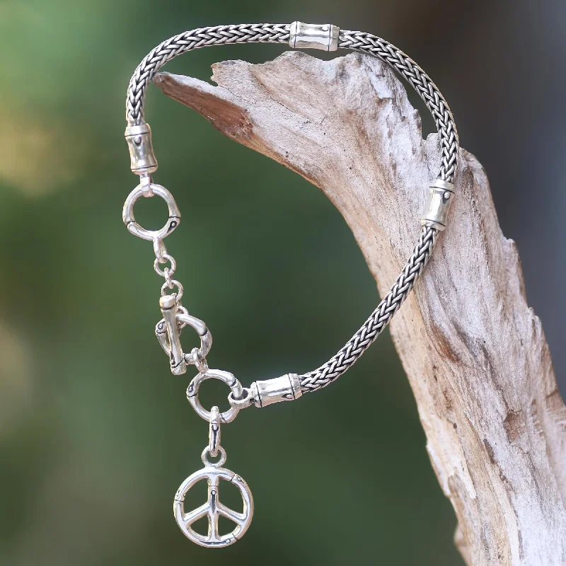 Adjustable bangle bracelets with toggle clasps for easy, secure wearing-Peaceful Bamboo Artisan Crafted Sterling Silver Bracelet with Peace Charm