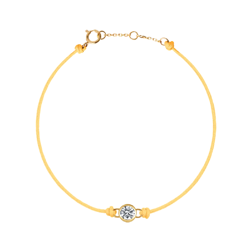 Gold bangle bracelets for women with a minimalist and sleek design-Round brilliant bezel cord bracelet