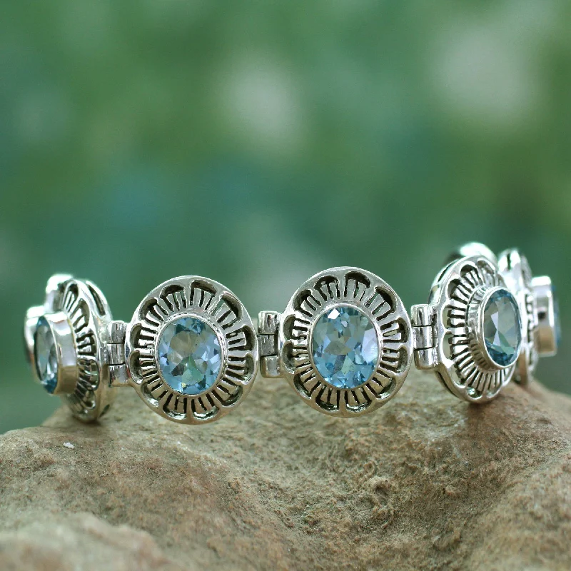 Best bangle bracelets with crystal inlays for a sparkling, glamorous appearance-Sky Blossoms Blue Topaz Link Bracelet