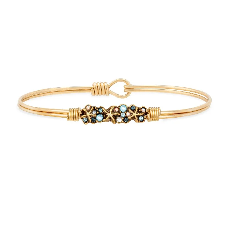 Best bangle bracelets with crystal inlays for a sparkling, glamorous appearance-Starfish Medley Bangle