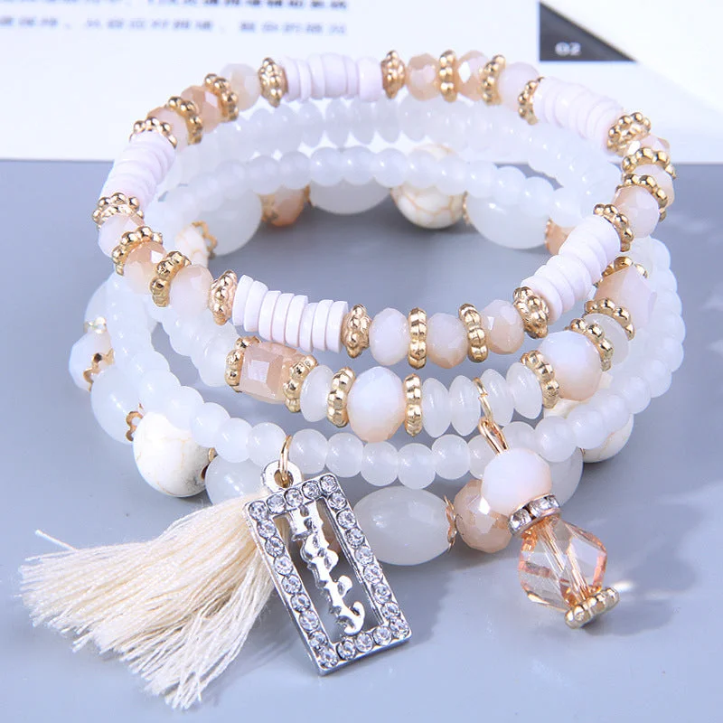 Traditional gold bangle bracelets with a smooth finish for a classic look-Wholesale Versatile Love Tassel Alloy Bracelet